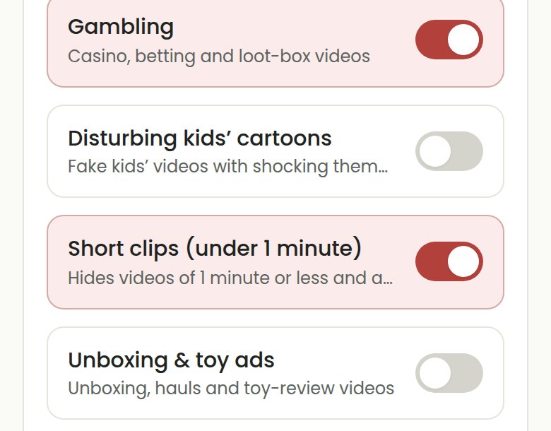 COONI Blocked content switches, with "Short clips (under 1 minute)" switched on.
